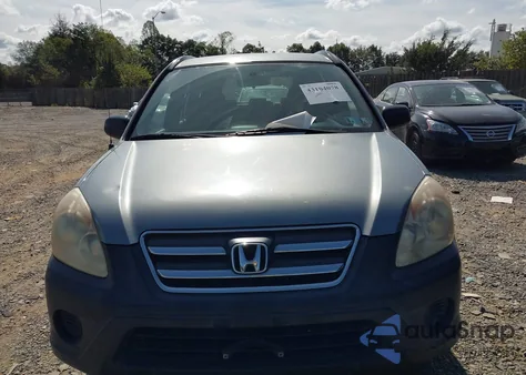 2006 Honda Cr-V Lx z USA, uszkodzony, nr VIN SHSRD785X6U446292